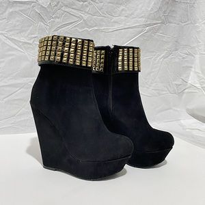 Black velvet heeled boots. With fake leather strip and golden gems. Size 7.